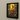LED snap frame featuring a colorful artwork of a man with framed fish on the wall.